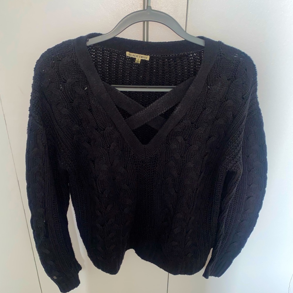Oversized black sweater with cross neck
